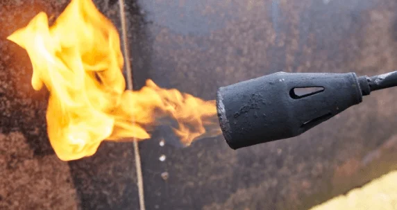 propane blowtorch close up during terrace waterproofing solution