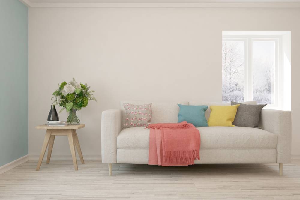 Comfortable sofa in a tastefully painted living room - Aapka Painter Blogs
